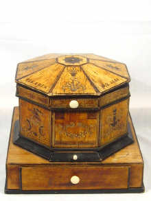 Appraisal: An octagonal wooden cigar compendium with ivory handles each panel