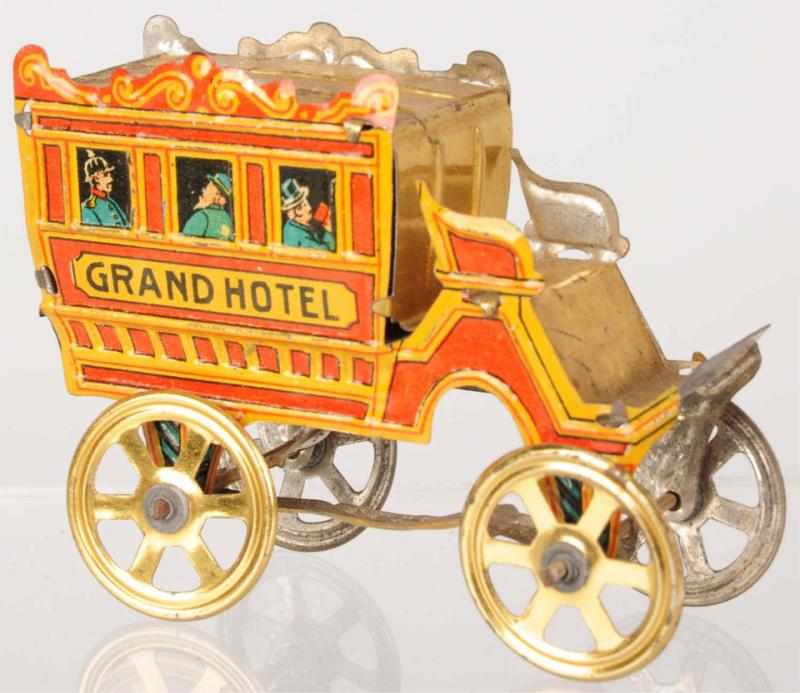 Appraisal: Tin Litho Stage Coach Penny Toy German Marked Grand Hotel