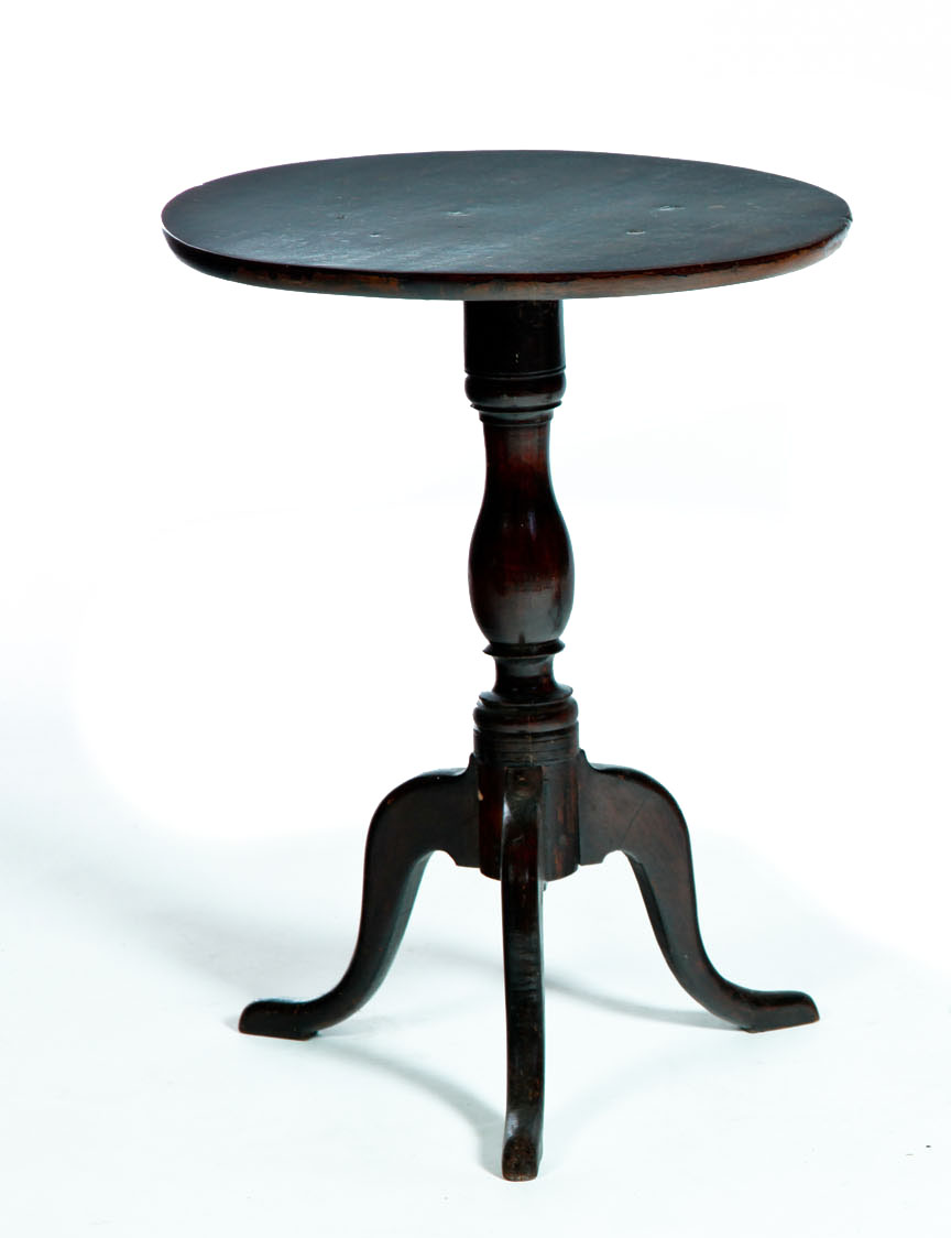 Appraisal: CHIPPENDALE CANDLESTAND American th- th century cherry Round top and