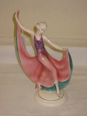 Appraisal: AN ART DECO KATZHUTTE POTTERY FIGURE modelled as a dancing