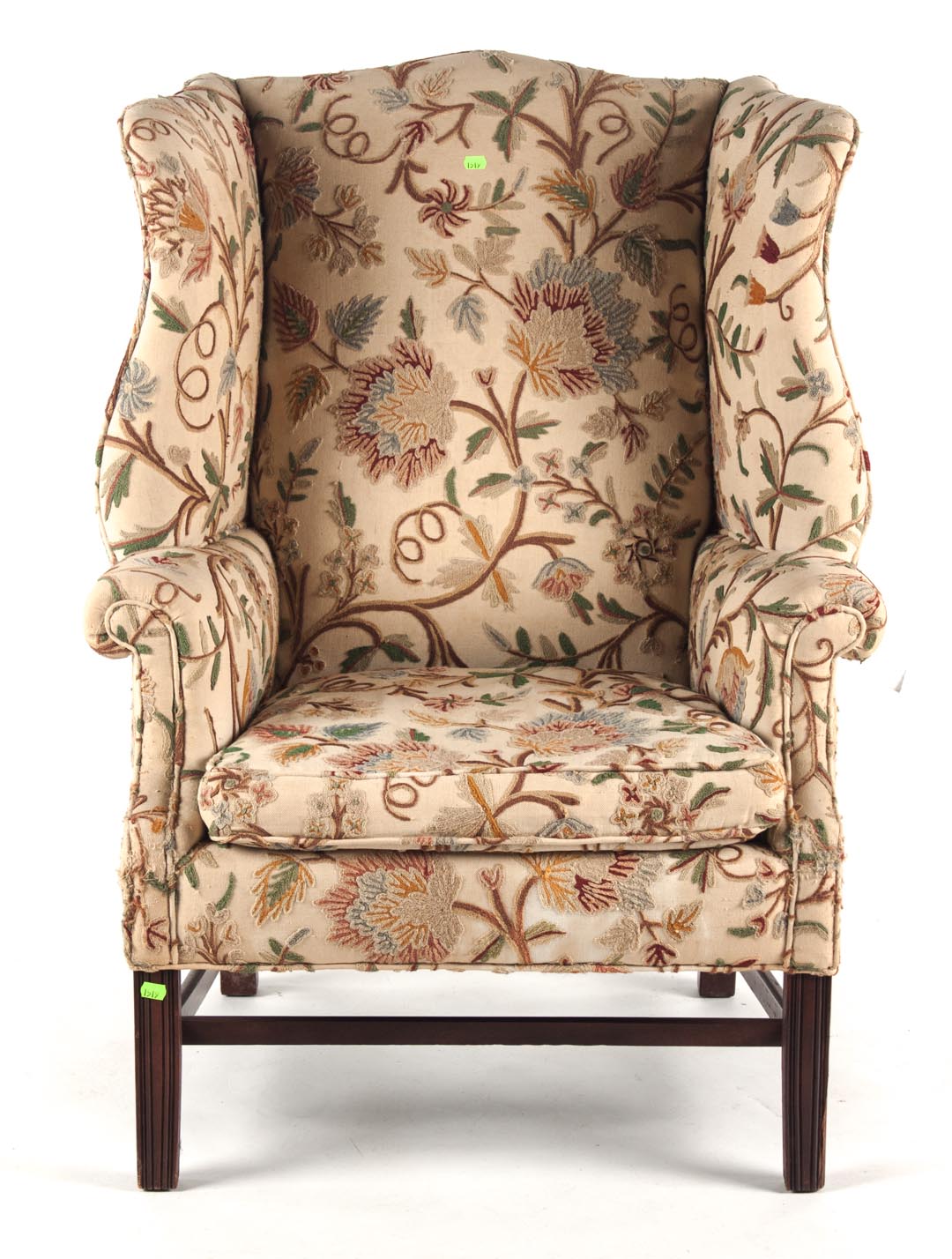 Appraisal: Chippendale style mahogany wing chair with crewel upholstery reeded legs