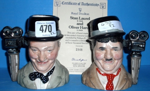 Appraisal: Royal Doulton small Character jugs Stan Laurel D And Oliver