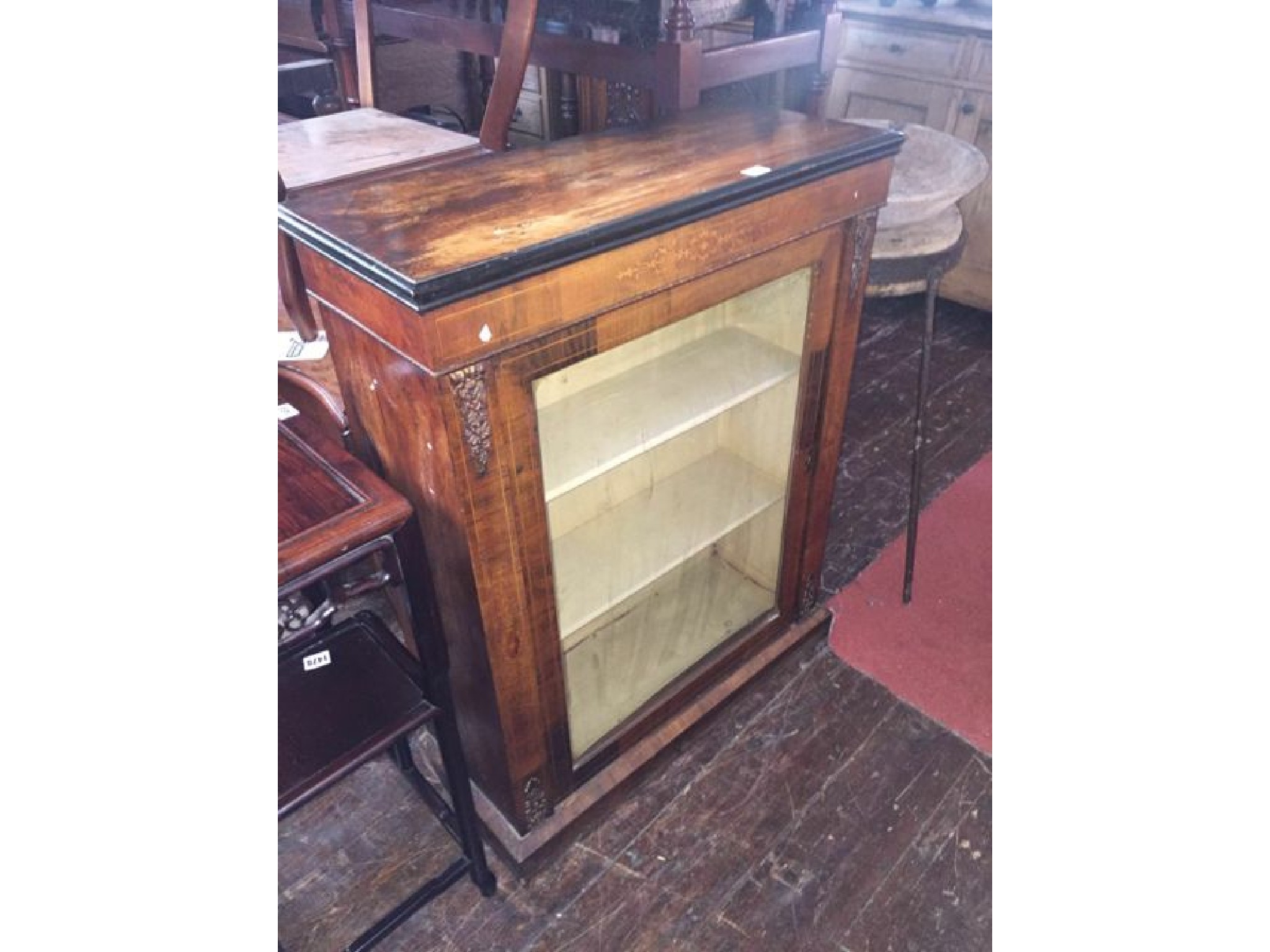 Appraisal: A Victorian walnut pier cabinet with inlaid detail