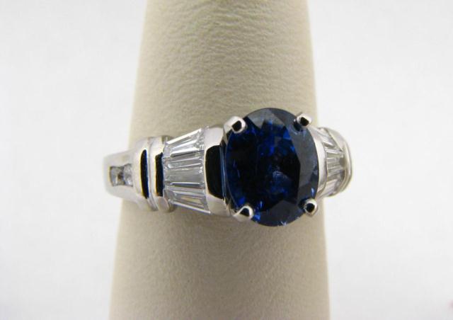 Appraisal: Lady's Platinum ct Sapphire Baguette and Round Diamond Ring