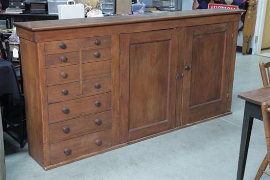 Appraisal: APOTHECARY CABINET Pine with poplar secondary Eleven drawers and two