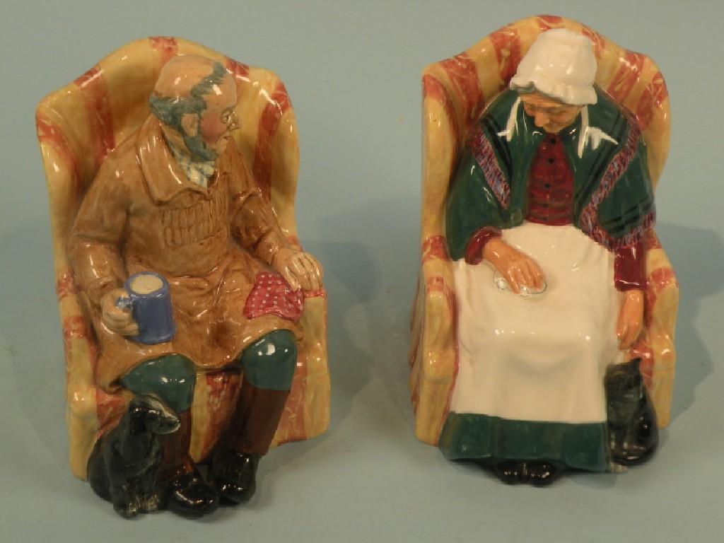 Appraisal: A pair of Royal Doulton porcelain figures of Uncle Ned