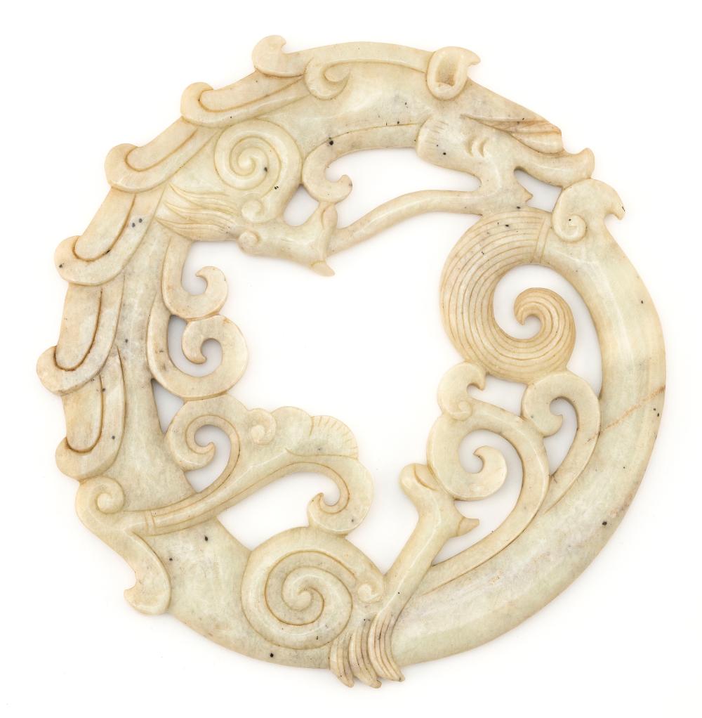 Appraisal: CHINESE CARVED CHICKEN BONE JADE BI DIAMETER CHINESE CARVED CHICKEN