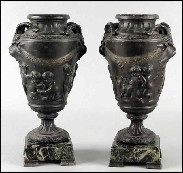 Appraisal: PAIR OF PATINATED METAL URNS Together with marble bases Urn