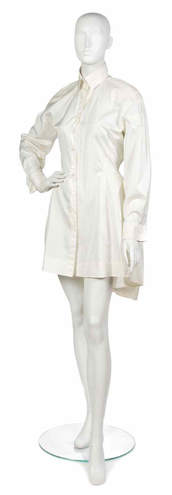 Appraisal: An Alaia White Nylon Shirt Dress French cuffs high-low hem