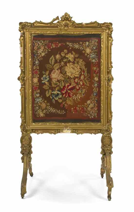 Appraisal: A Louis XV Style Giltwood Firescreen having a foliate and