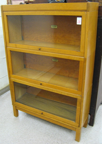 Appraisal: THREE-SECTION STACKING OAK BOOKCASE The C J Lundstrom Mfg Co