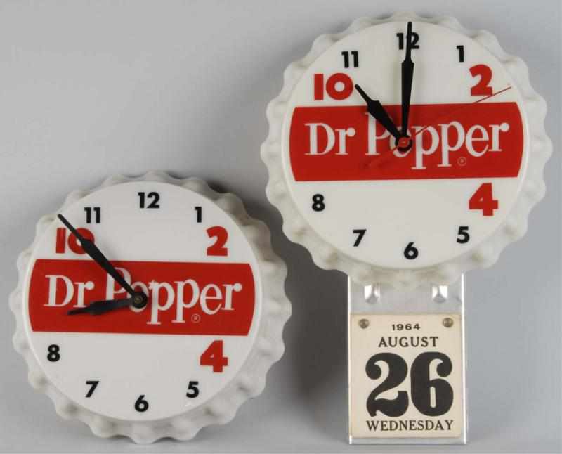 Appraisal: Lot of Plastic Dr Pepper Light Up Clocks Description Circa