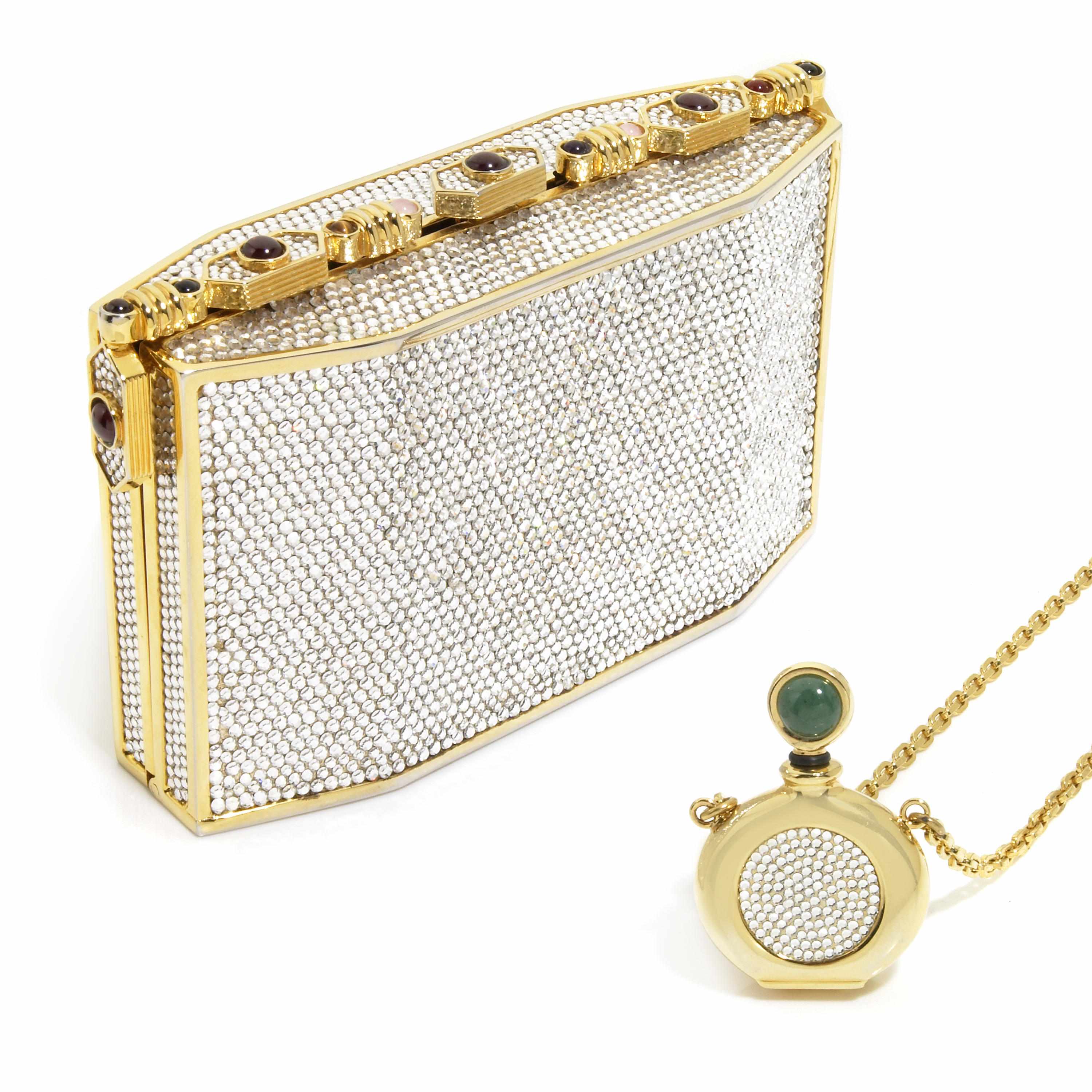 Appraisal: A rectangular silver crystal purse with a semi-precious stone lined