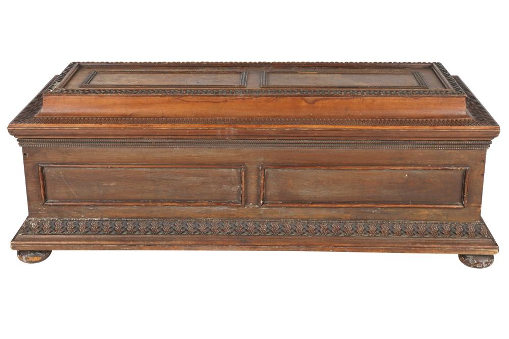 Appraisal: CARVED WOOD CASSONEwith hinged lid and forged iron handles Condition