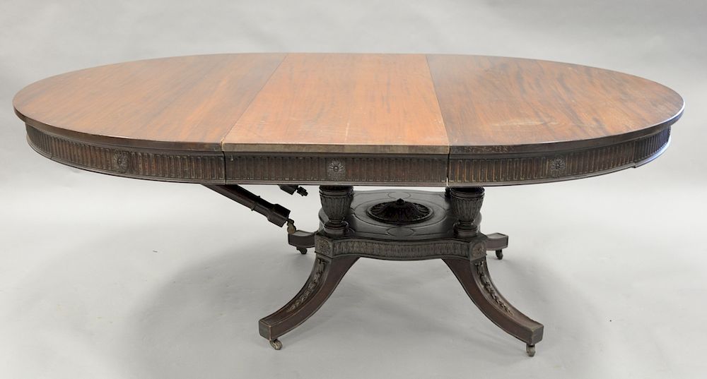 Appraisal: Round Victorian mahogany single pedestal table with six inch leaves