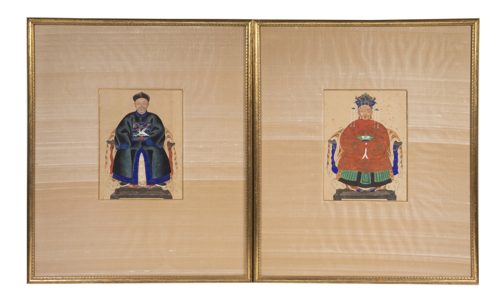 Appraisal: A PAIR OF CHINESE ANCESTRAL PORTRAITS COURT DIGNITARY AND WIFE