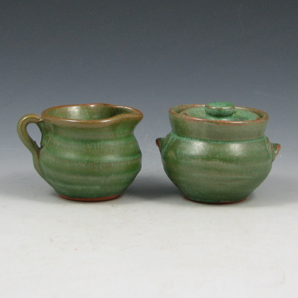 Appraisal: Small Southern Pottery Cabinet Creamer Sugar Small Southern pottery creamer