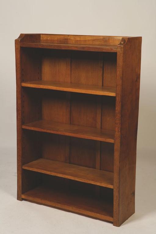 Appraisal: ROBERT THOMPSON THE MOUSEMAN An oak open fronted bookcase with