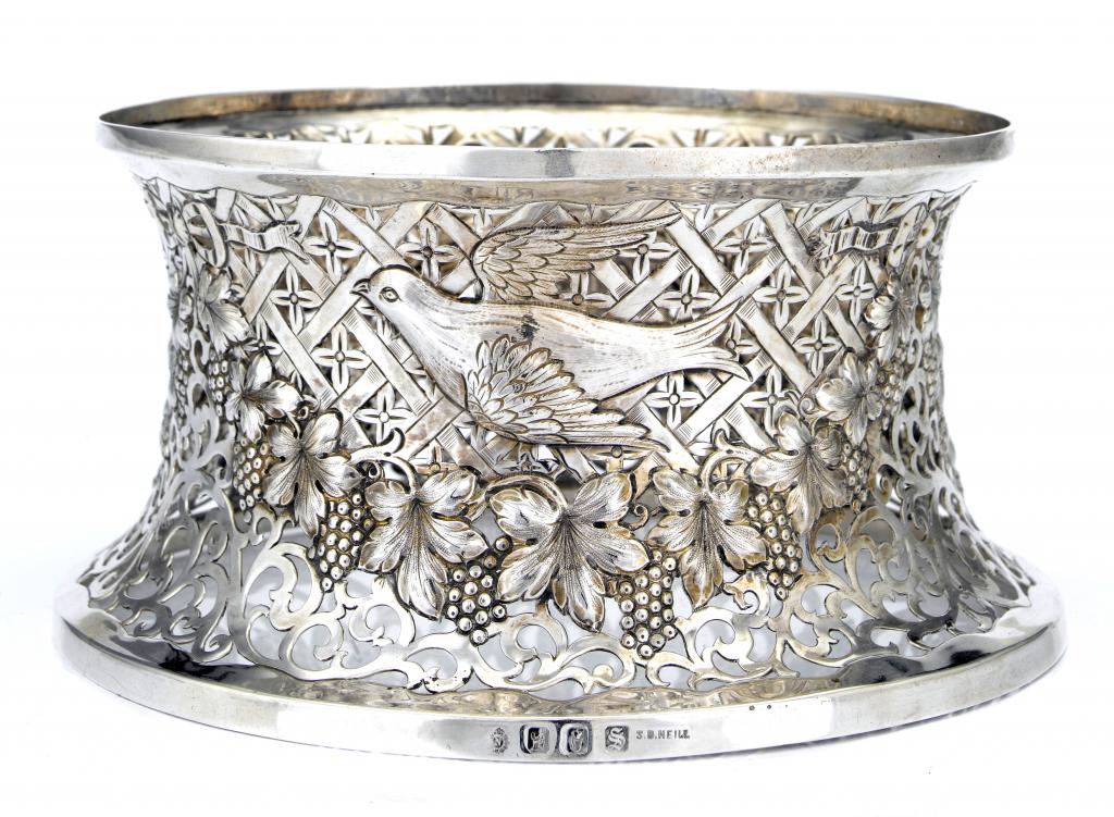 Appraisal: AN IRISH GEORGE V DISH-RING pierced and embossed with birds