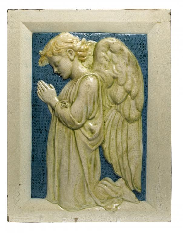 Appraisal: A DELLA ROBBIA EARTHENWARE ARCHITECTURAL RELIEF OF AN ANGEL AT