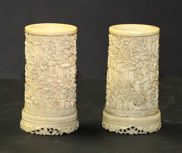 Appraisal: A pair of miniature export ivory brush pots th Century