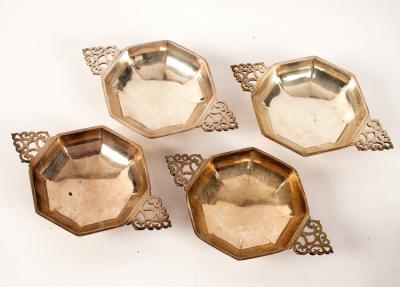 Appraisal: Four silver octagonal sweetmeat dishes three by Goldsmiths Silversmiths Company