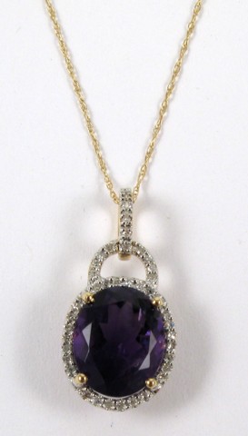 Appraisal: AMETHYST AND DIAMOND PENDANT NECKLACE The pendant is suspended on