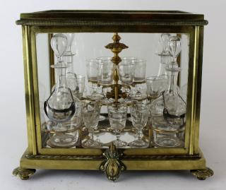 Appraisal: French bronze glass tantalus set French bronze glass tantalus set