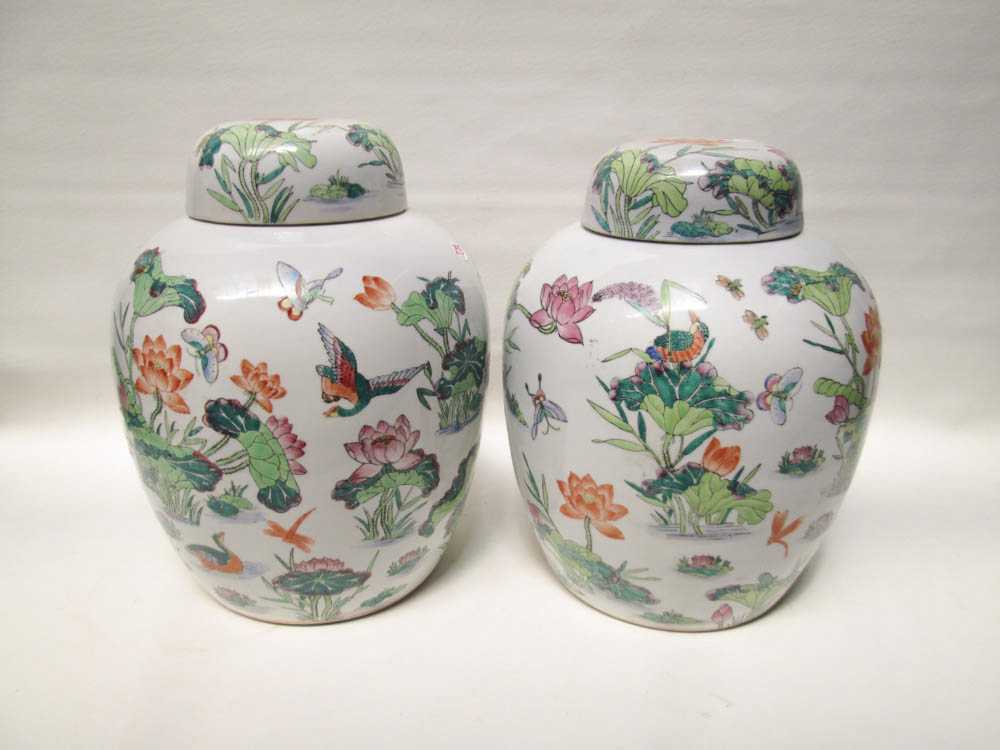 Appraisal: PAIR OF CHINESE PORCELAIN LIDDED JARS hand painted with aquatic