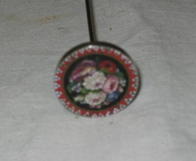 Appraisal: A MICRO MOSAIC HAT PIN of circular form depicting flowers