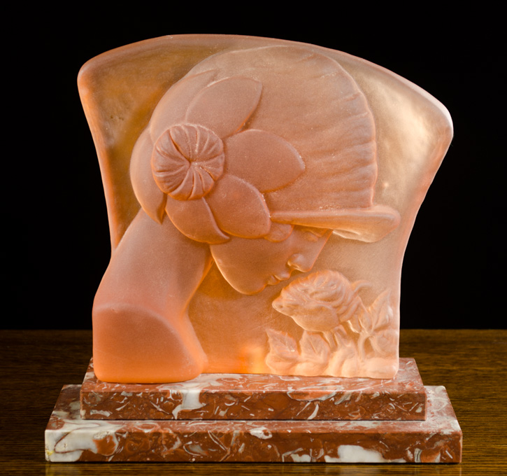 Appraisal: ART DECO PINK FROSTED GLASS SCULPTURE featuring a flapper girl