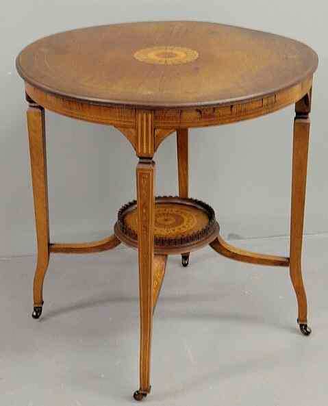 Appraisal: Ornate English rosewood round table the top with an inlaid