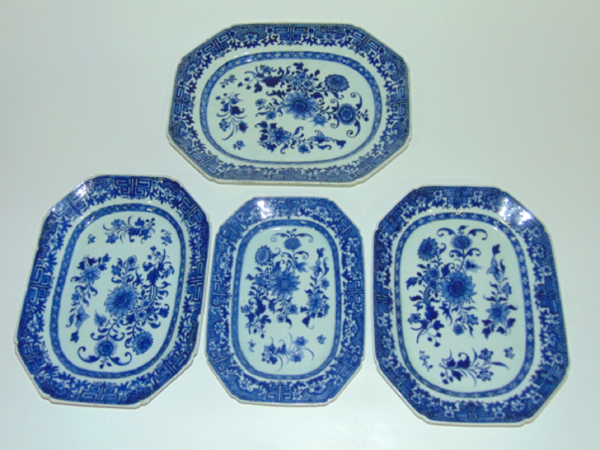 Appraisal: A graduated set of four th century oriental blue and