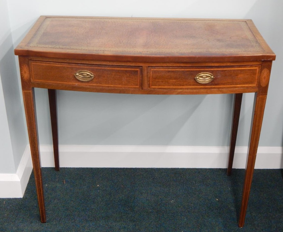 Appraisal: A late thC early thC mahogany writing table the bow