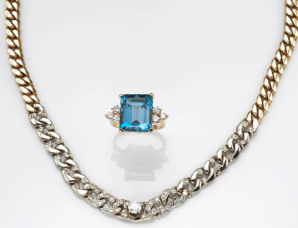 Appraisal: A diamond k white and k bicolor gold curb link