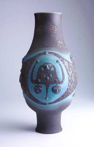 Appraisal: SCHEIER Monumental and early footed floor vase embossed with faces