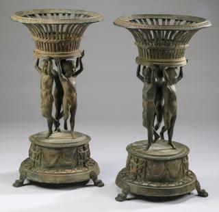 Appraisal: Bronze jardinieres with cherubs h Pair of Continental bronze jardinieres