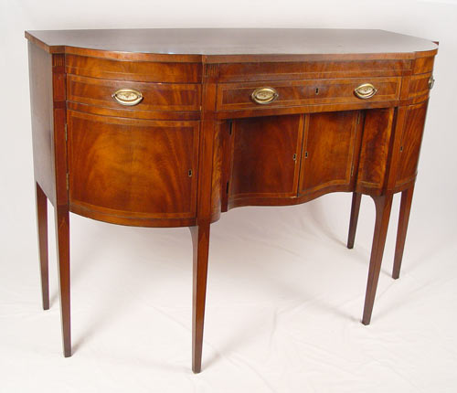 Appraisal: KITTINGER COLONIAL WILLIAMSBURG MAHOGANY SIDEBOARD CW flame grain mahogany sideboard