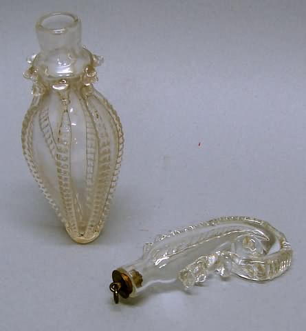 Appraisal: th century American seahorse swirl shape with rigaree teadrop bottle