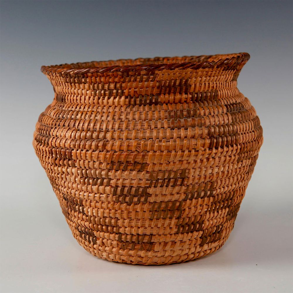 Appraisal: NATIVE AMERICAN WOVEN BASKET Two-tone woven basket over a willow