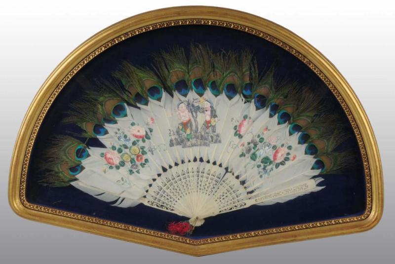 Appraisal: Handpainted Peacock Feather Fan Description Framed under glass Features an