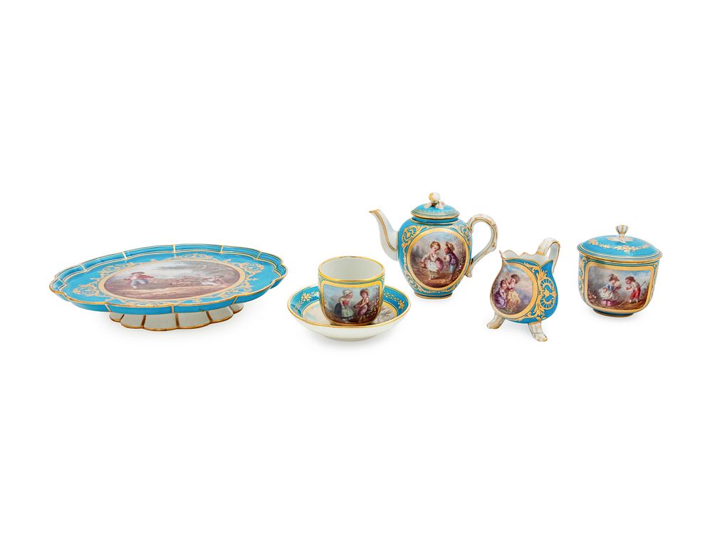 Appraisal: A Sevres Style Painted and Parcel Gilt Porcelain Tea Service