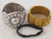 Appraisal: A mixed lot comprising a gilt metal bangle decorated with