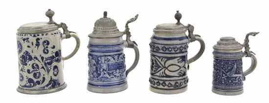 Appraisal: A Collection of Four Salt Glaze Pewter Mounted Steins of