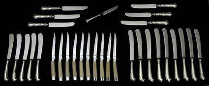 Appraisal: Thirty-Four French Silver Pistol-Handled Knives with Later Stainless Steel Blades