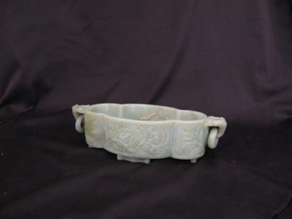 Appraisal: Oval nephrite jade bowl with straight sides and ring handles