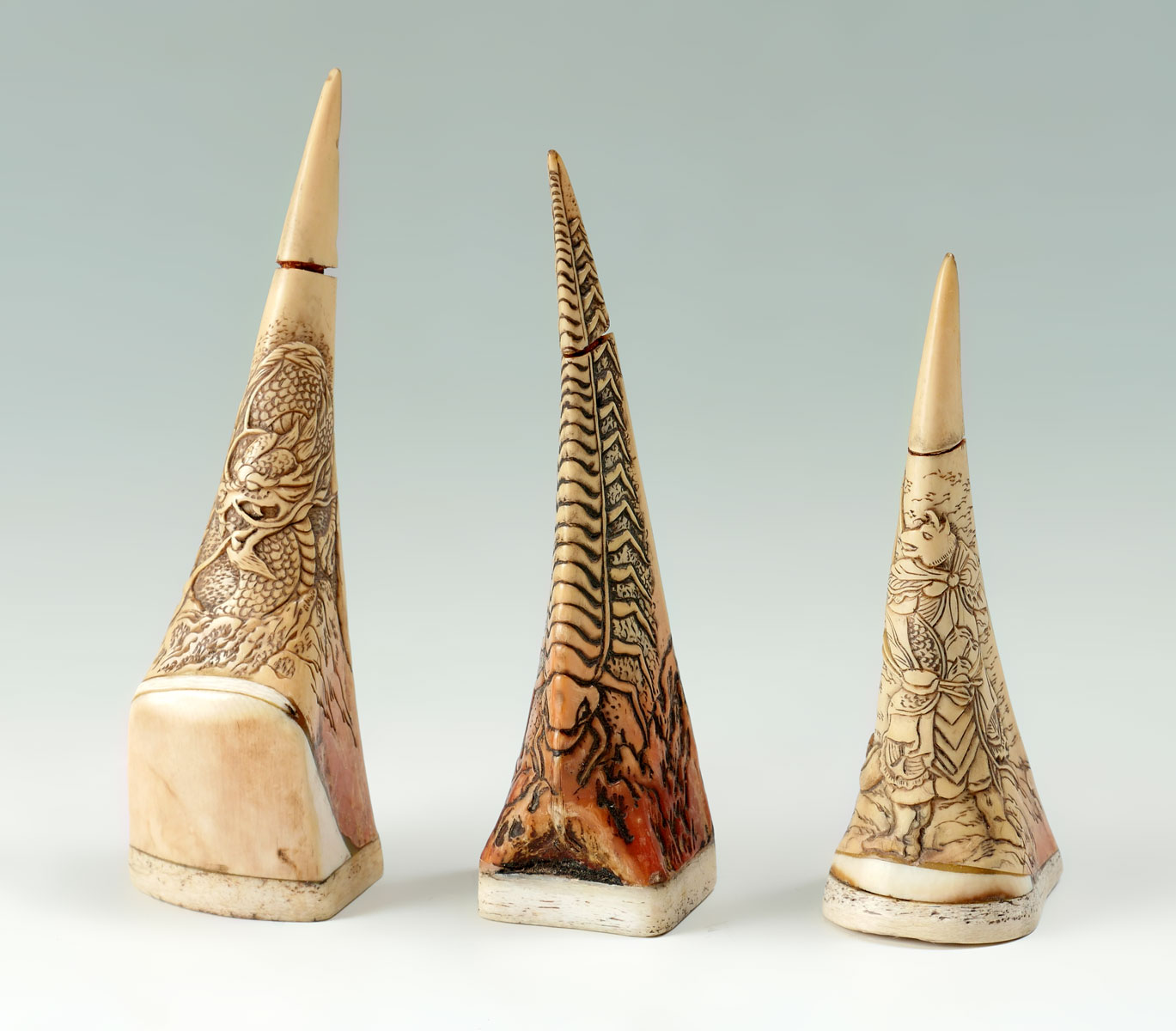 Appraisal: HORN BILL SCRIMSHAW SNUFF BOTTLES elaborately carved Scrimshaw Horn Bills