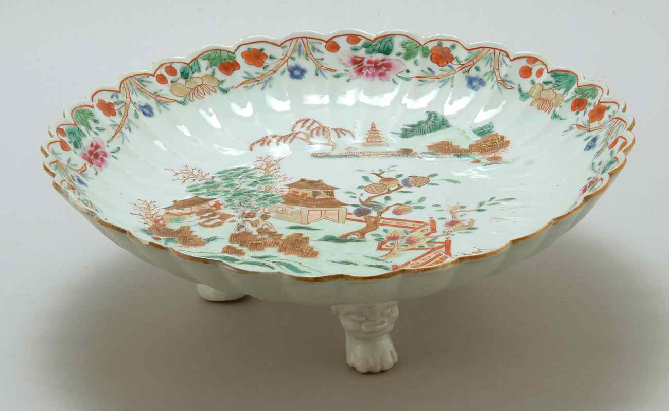 Appraisal: CHINESE FAMILLE ROSE PORCELAIN CHARGER th CenturyWith fluted sides floral