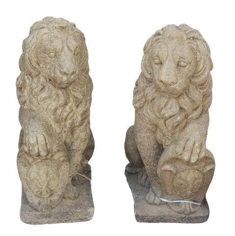 Appraisal: pair Cast stone garden statuary Heraldic Lions th c seated