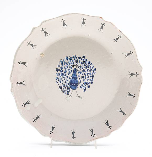 Appraisal: A porcelain plate with peacock decoration signed PB diameter in